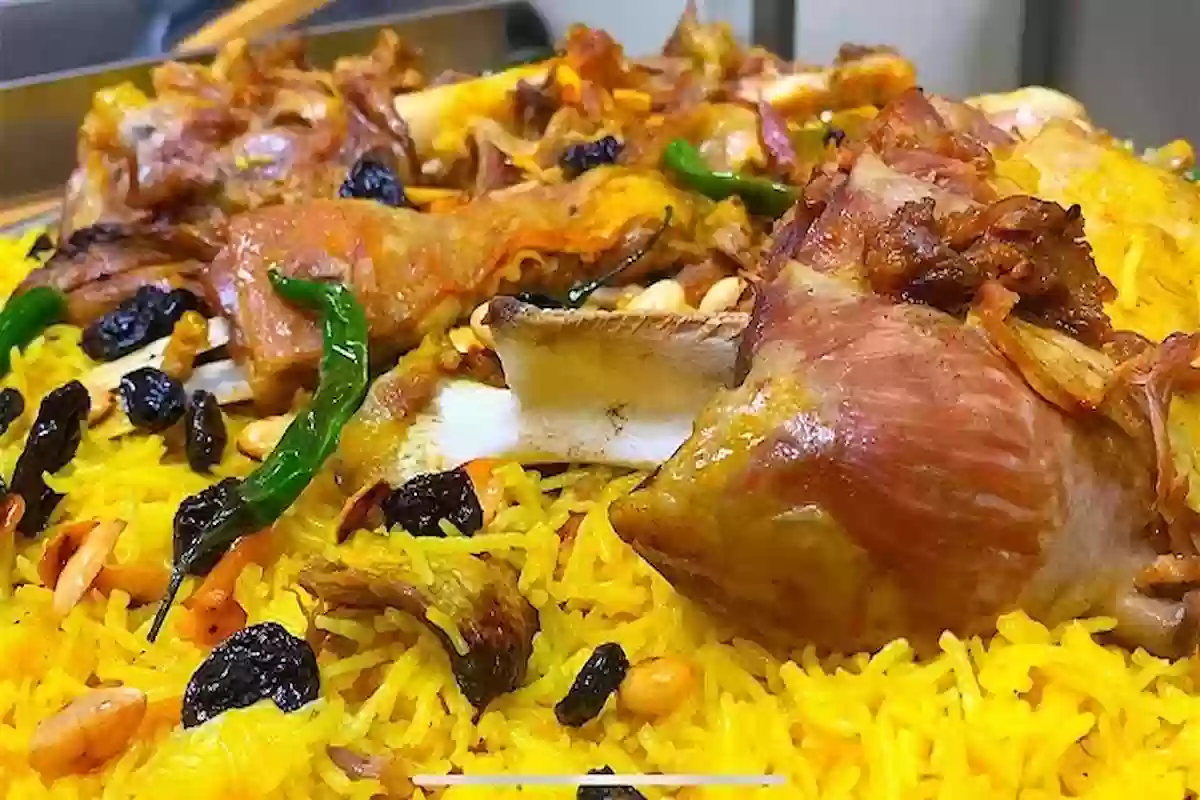 طريقة عمل أرز مندي في قدر الضغط خطوة بخطوة